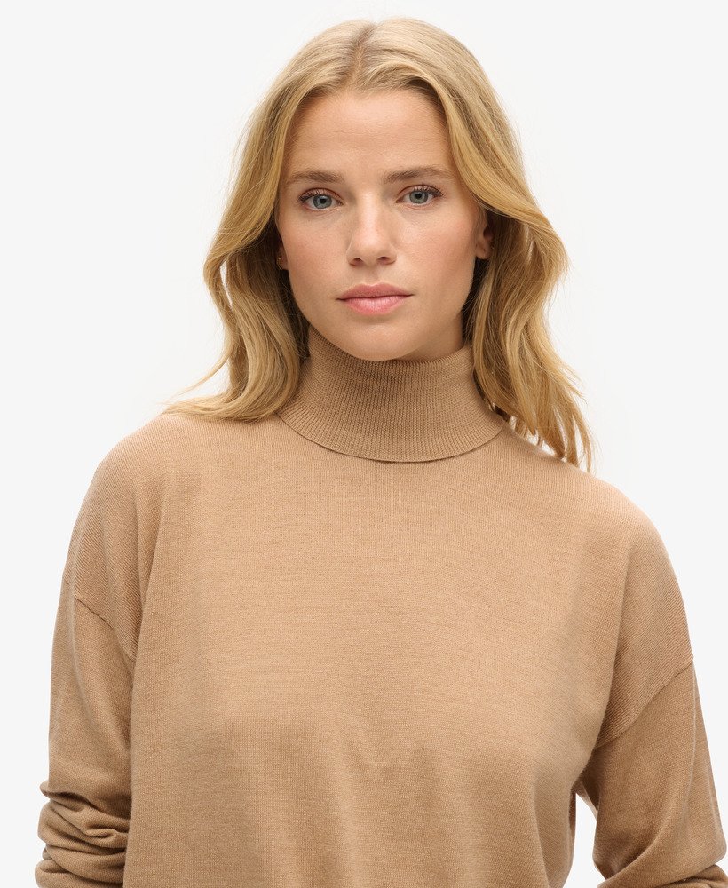merino trui met verlaagde schouders en rolkraag in pralinekleur
