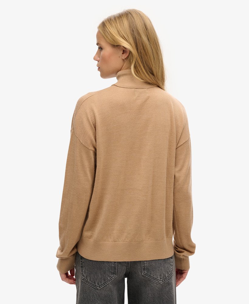 merino trui met verlaagde schouders en rolkraag in pralinekleur
