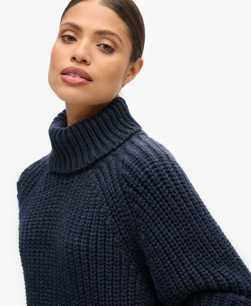 slouchy gebreide coltrui in marineblauw gemêleerd