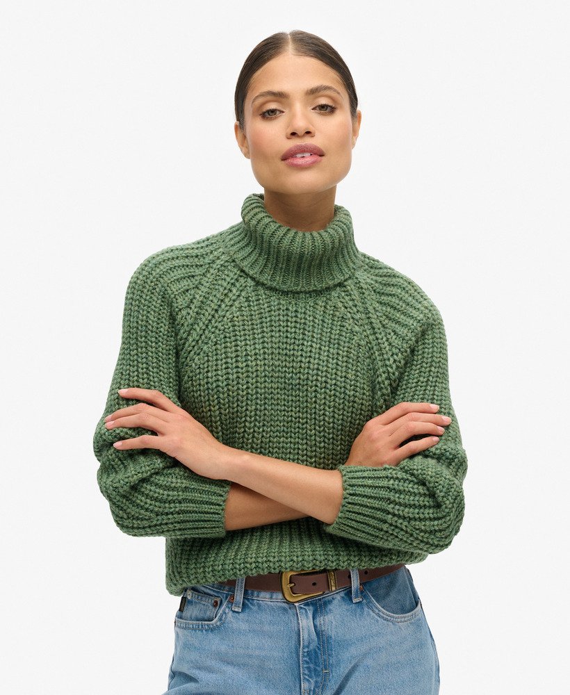 slouchy gebreide coltrui in donker saliegroen gemêleerd.