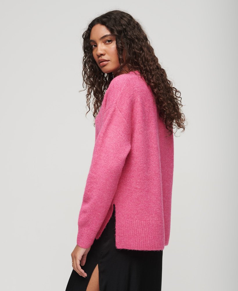 oversized v-hals trui in gemêleerd roze.