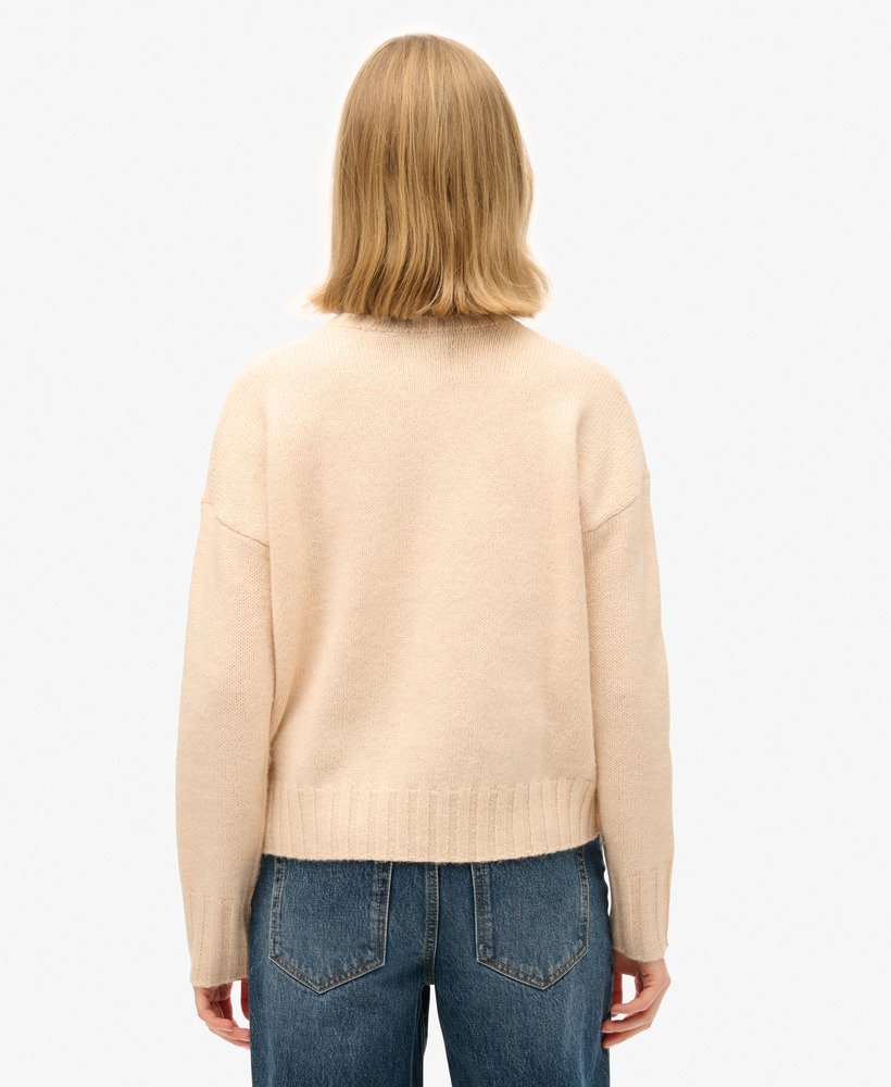 essentiële trui met ronde hals in shadow pale pink.