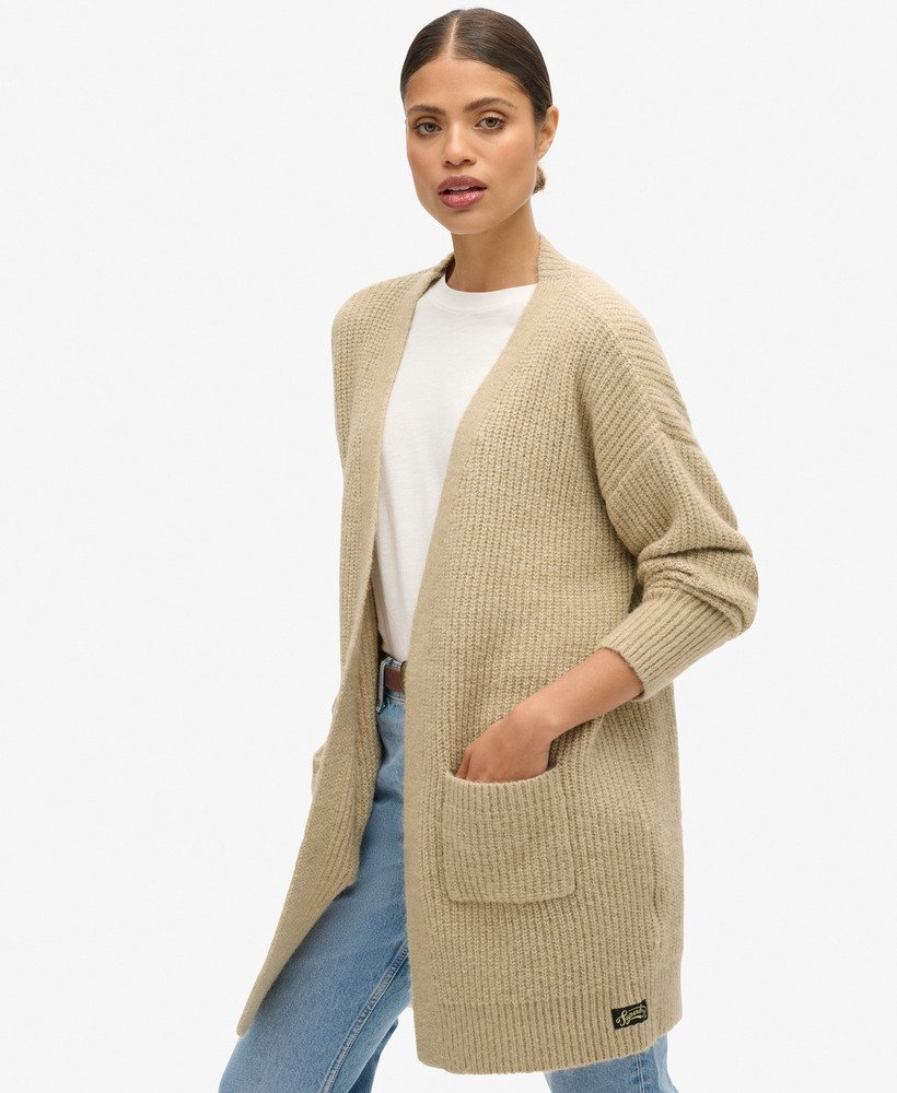 essentieel lang gebreid vest in fudgebruin.
