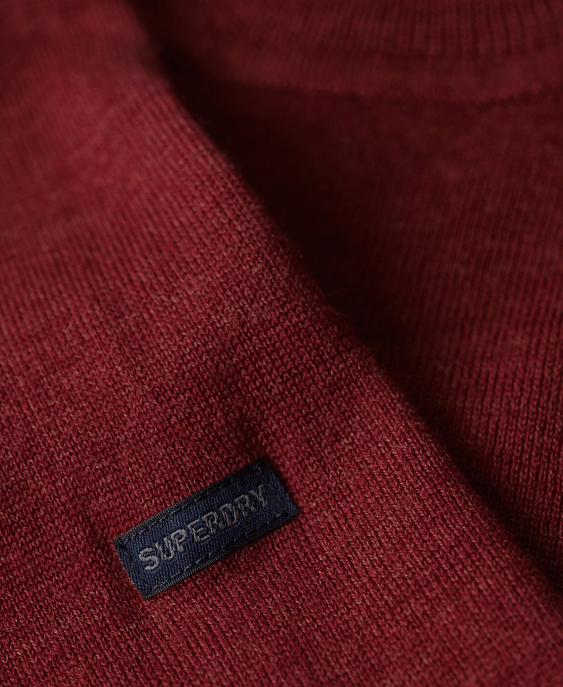 merino trui met ronde hals in furnace red marl