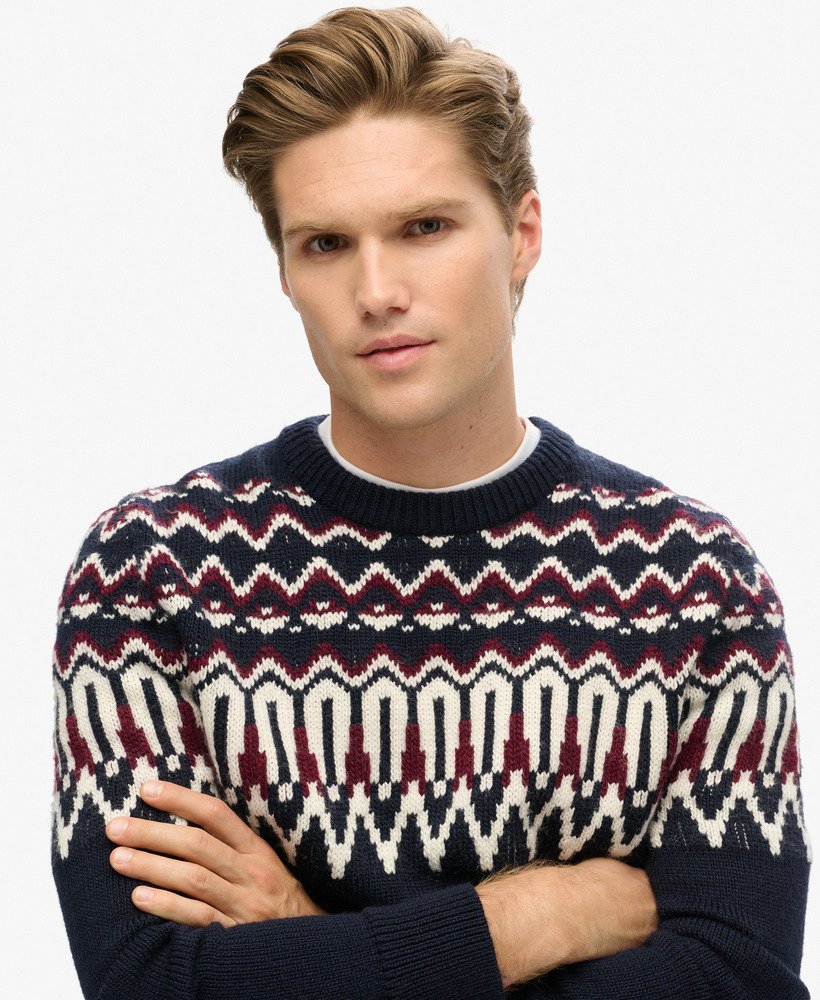 fairisle gebreide trui met ronde hals in marineblauw met meerdere kleuren.