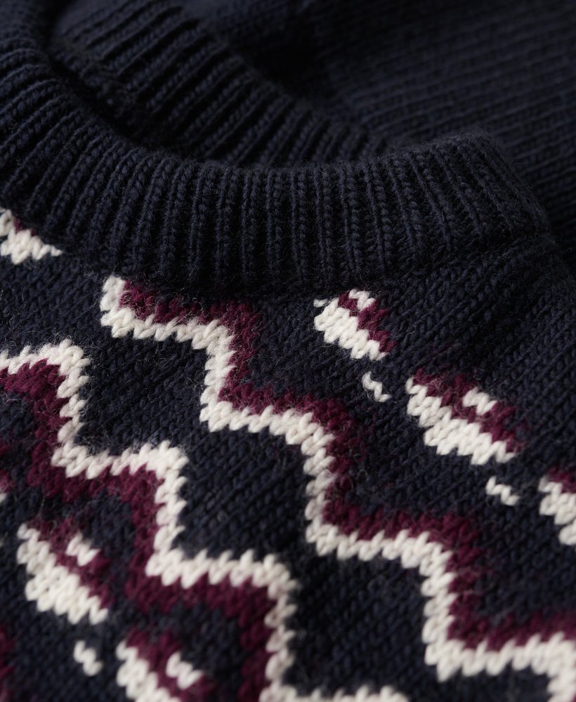 fairisle gebreide trui met ronde hals in marineblauw met meerdere kleuren.