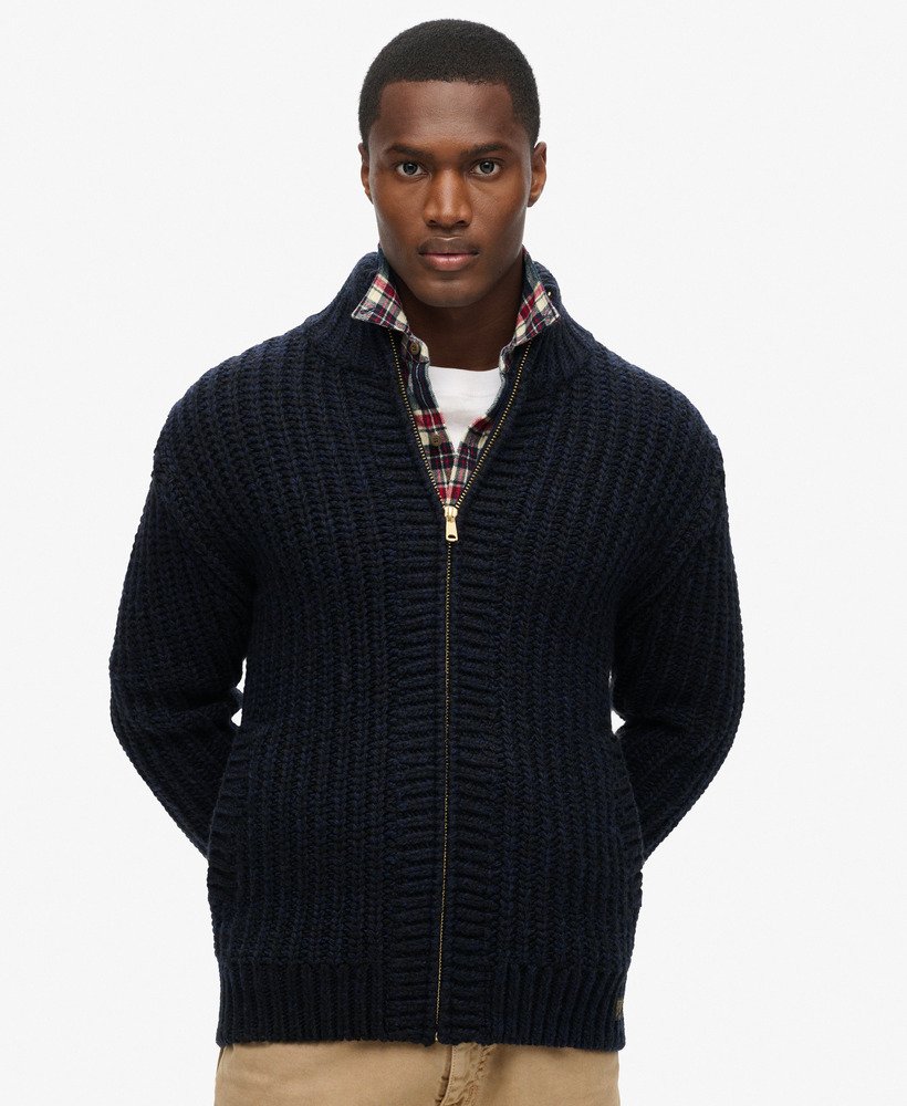 grof gebreid vest met ritssluiting in marineblauw en zwart met een twist.