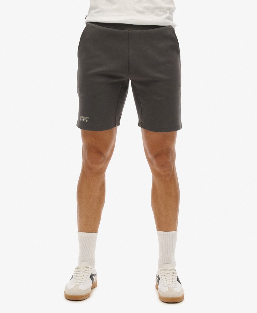 sport tech logo tapered shorts in donker leigrijs