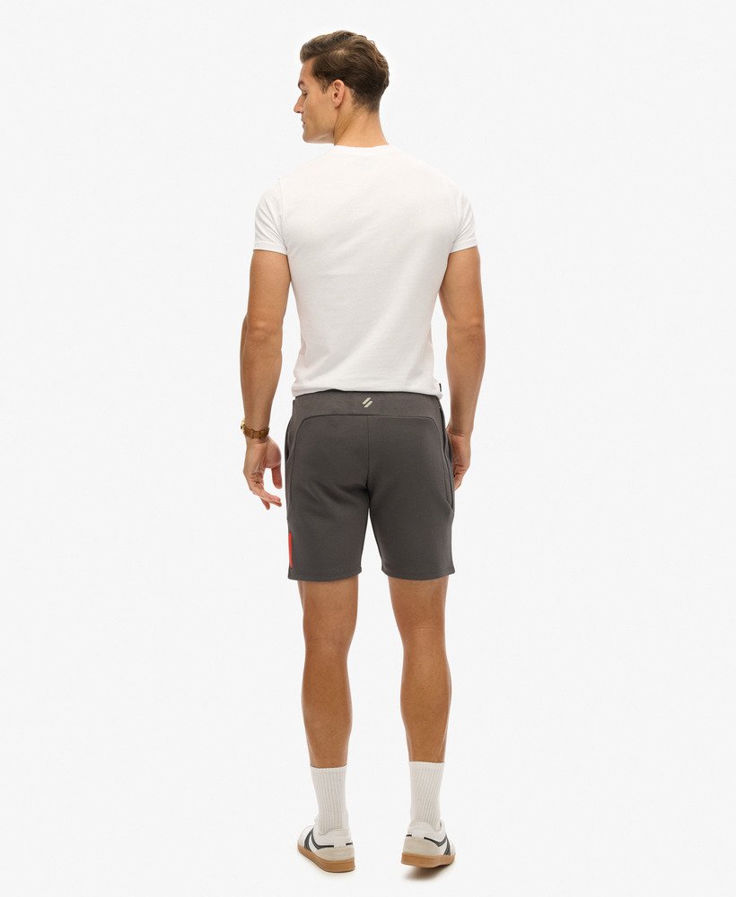 sport tech logo tapered shorts in donker leigrijs