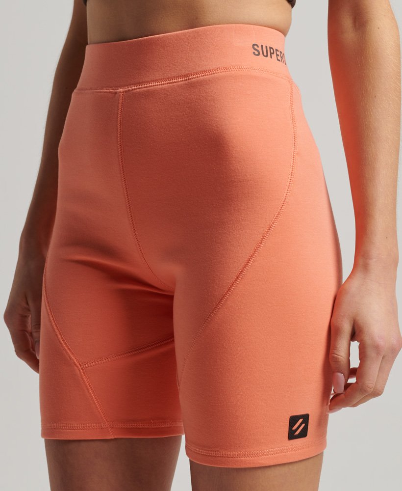 tech cycling shorts in pastelline coral