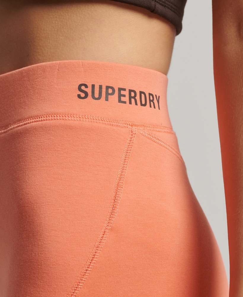 tech cycling shorts in pastelline coral