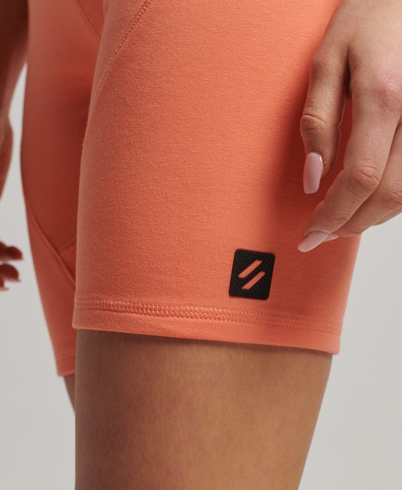 tech cycling shorts in pastelline coral
