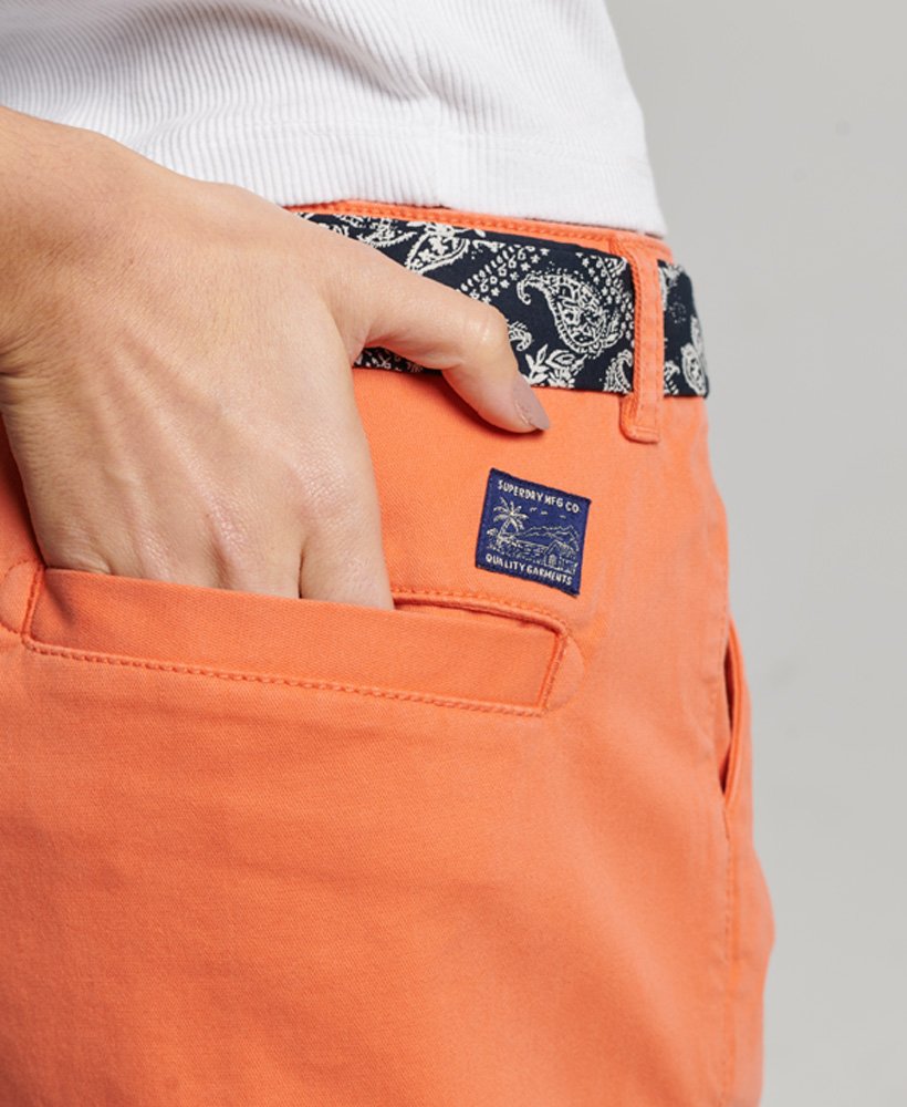 chino hot shorts in fluro coral