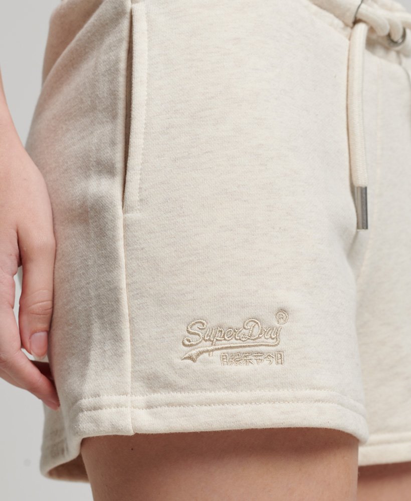 vintage jersey shorts met geborduurd logo in licht havermoutkleur.