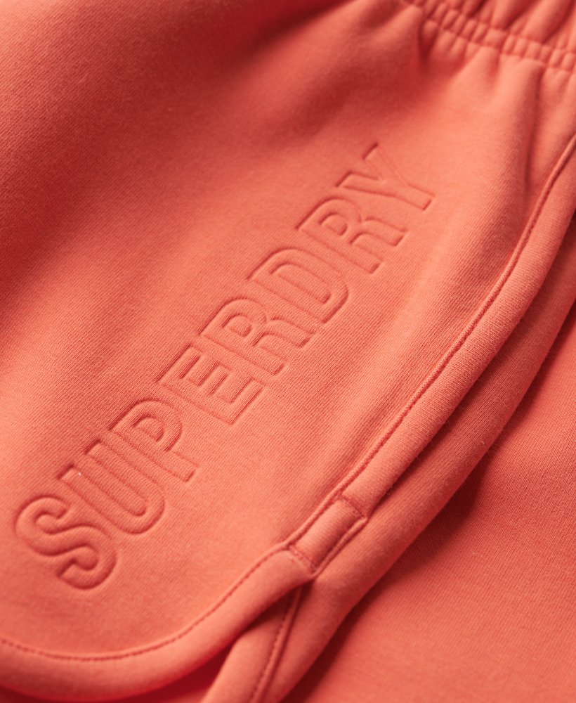 sports tech racer shorts in hot coral