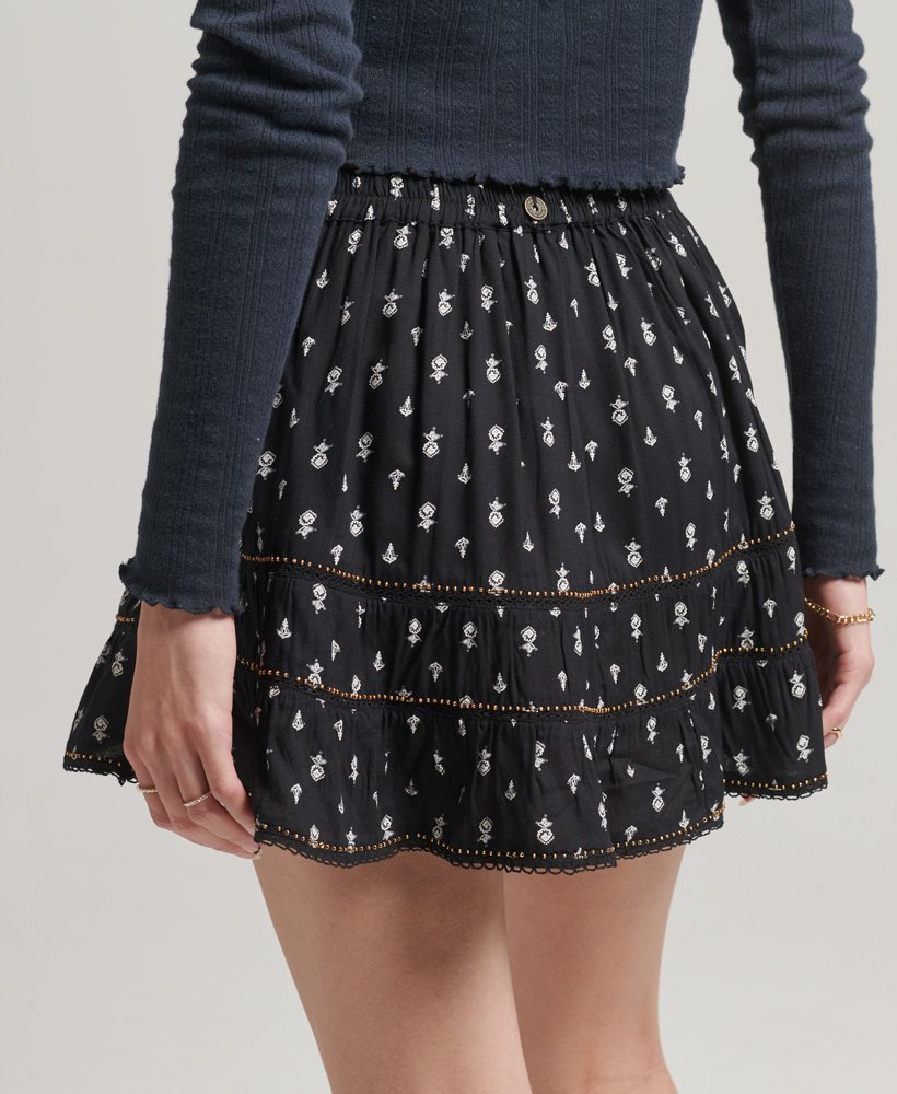 vintage minirok met versieringen in zwart geometrisch patroon