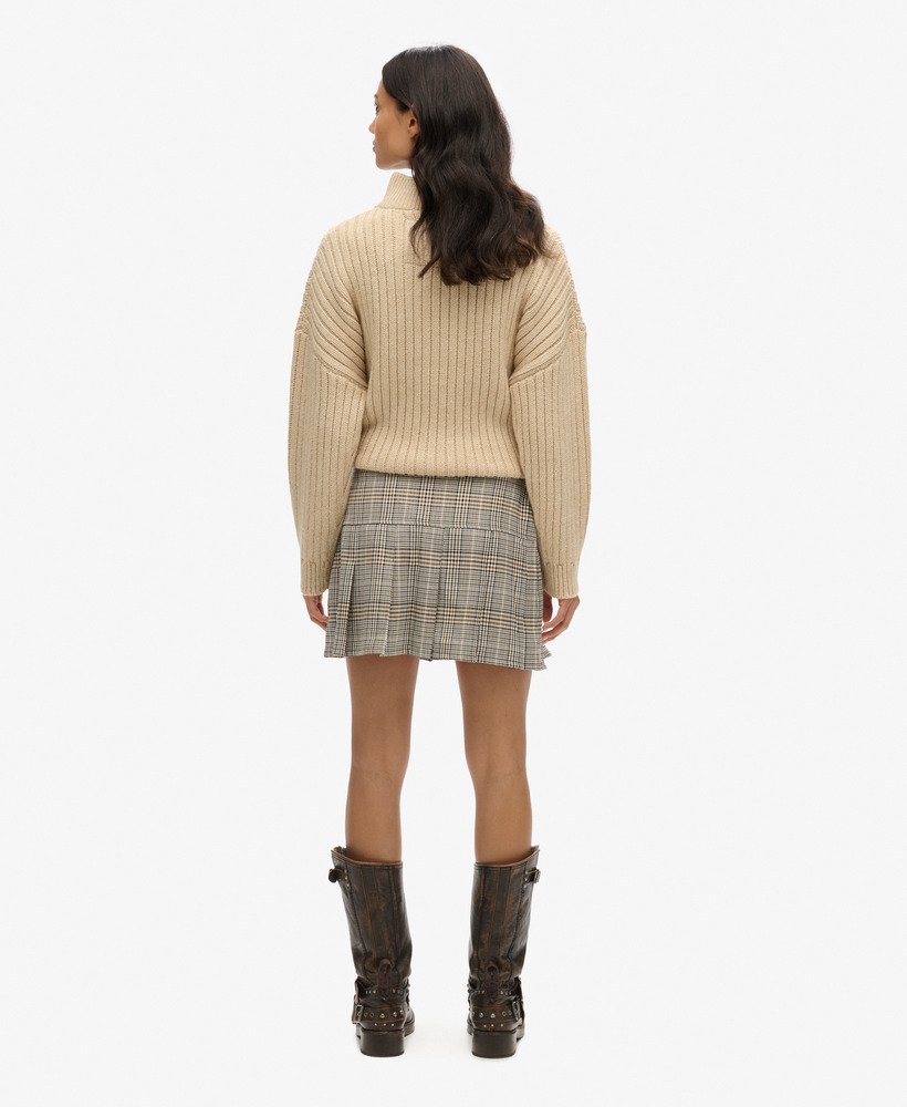 vintage geplooide minirok van tweed in neutrale tweedkleur.