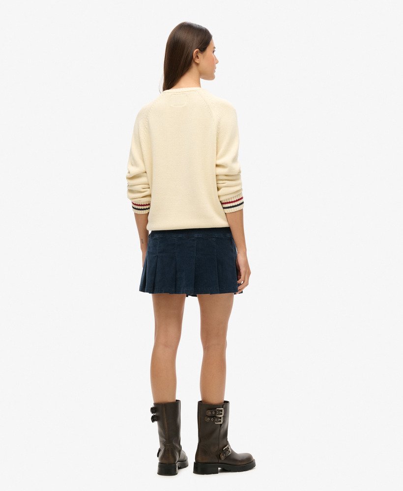 vintage geplooide minirok van corduroy in nautisch marineblauw.