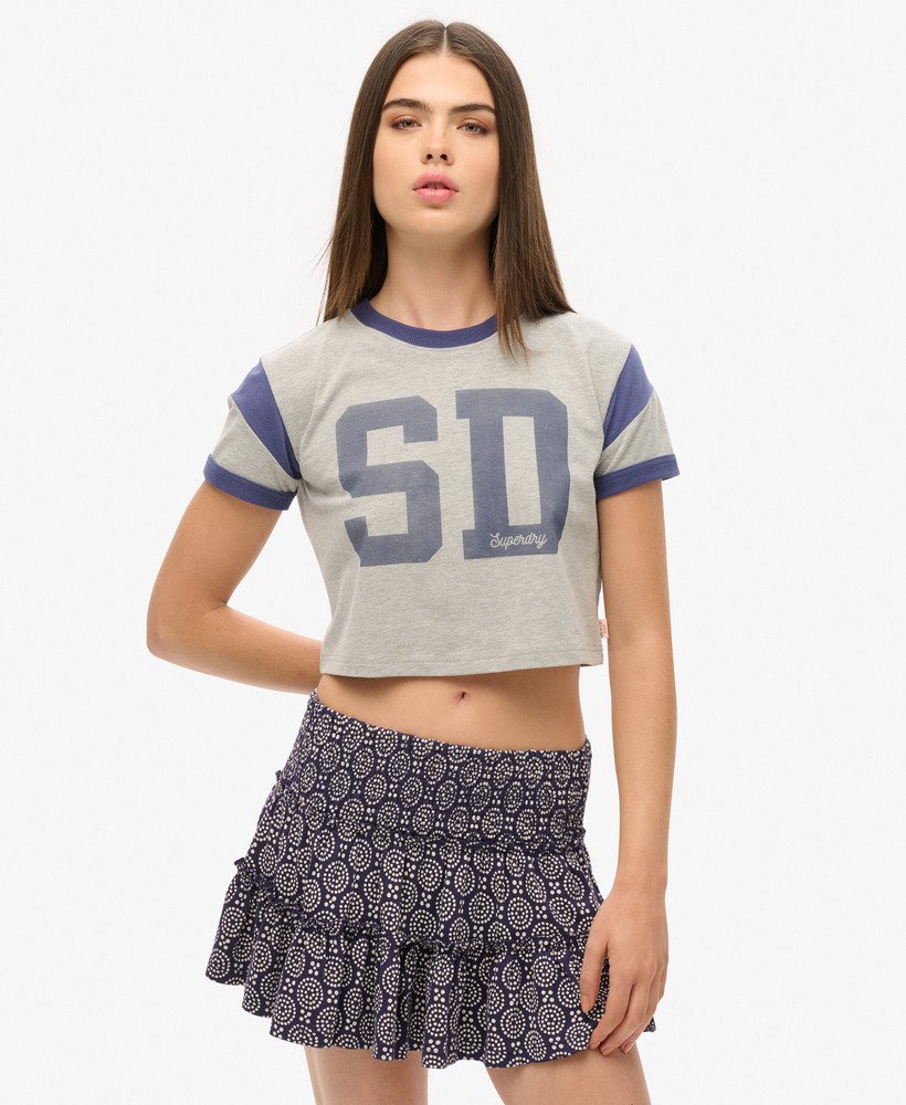 gelaagde jersey minirok in marineblauwe stippen- en bloemenprint