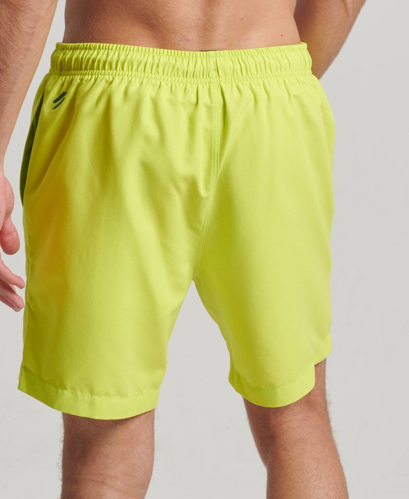 core sport 17 inch zwembroek van gerecycled materiaal in de kleur electric lime.