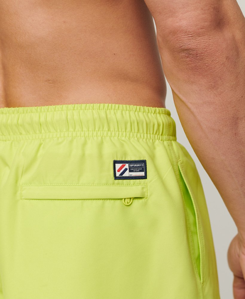 gerecyclede zwemshorts met applicaties van 48 cm in de kleur electric lime.