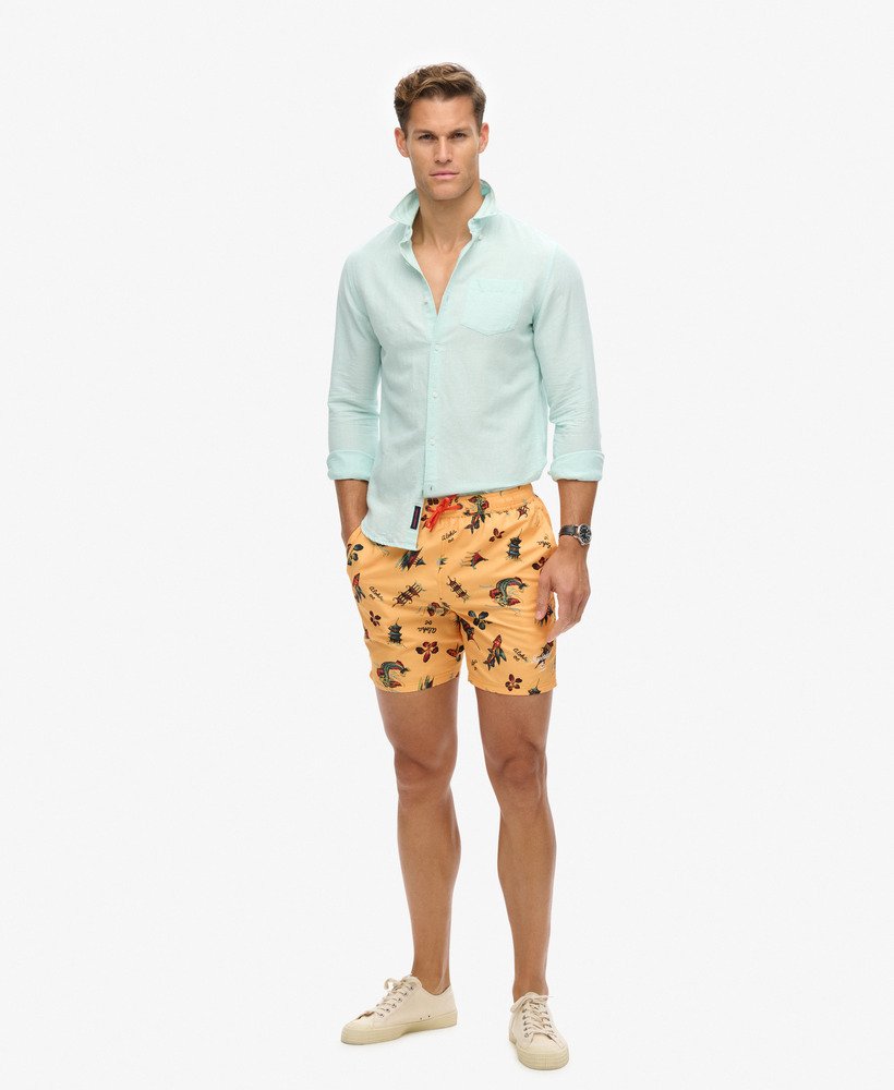 gerecyclede zwembroek met hawaïaanse print van 43 cm in aloha goudgeel.