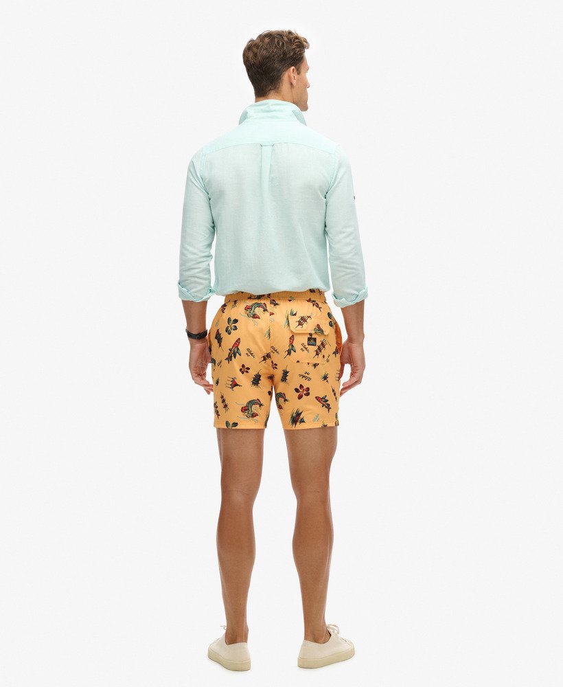 gerecyclede zwembroek met hawaïaanse print van 43 cm in aloha goudgeel.