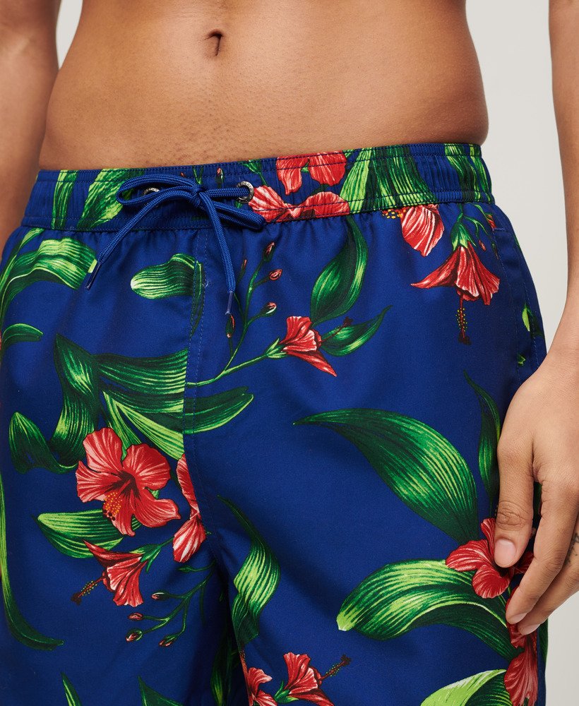 gerecyclede zwembroek met hawaïaanse print van 43 cm in hibiscus-koningsblauw.