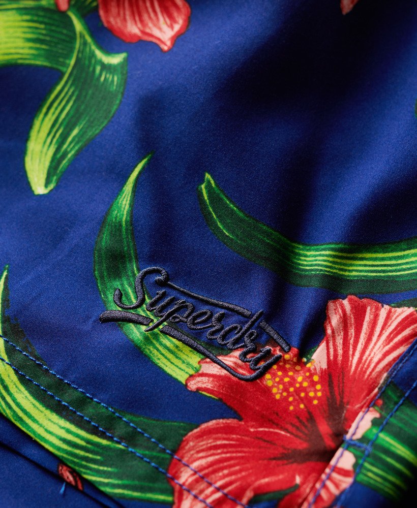 gerecyclede zwembroek met hawaïaanse print van 43 cm in hibiscus-koningsblauw.