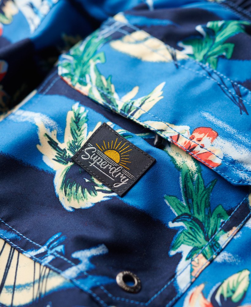 gerecyclede zwembroek met hawaïaanse print van 43 cm in dolfijnblauw.