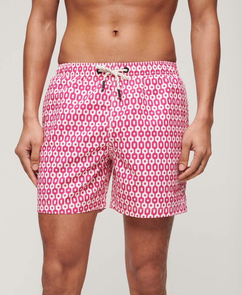 bedrukte gerecyclede zwembroek van 38 cm met roze geometrische print.