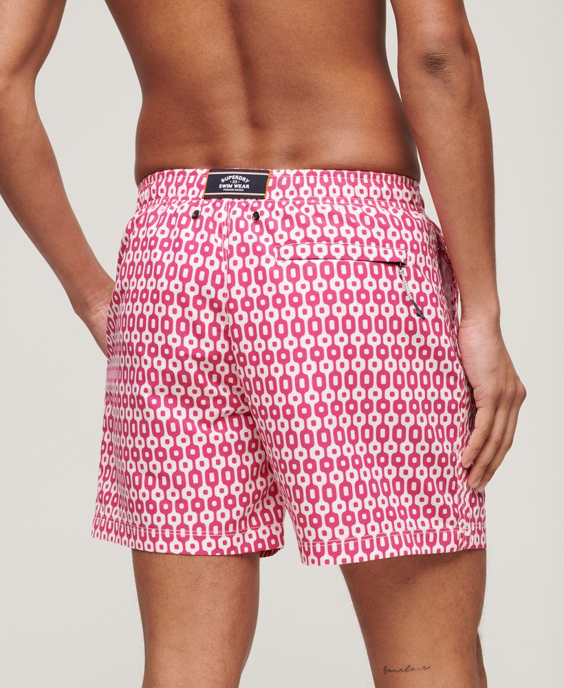 bedrukte gerecyclede zwembroek van 38 cm met roze geometrische print.