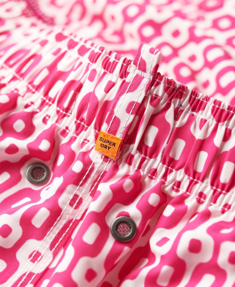 bedrukte gerecyclede zwembroek van 38 cm met roze geometrische print.
