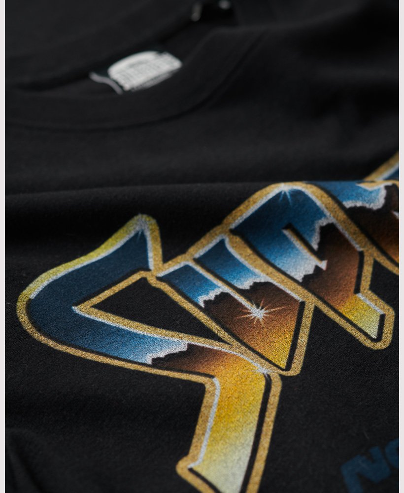 t-shirt met grafische print van een rockband uit de jaren 70 in zwart.