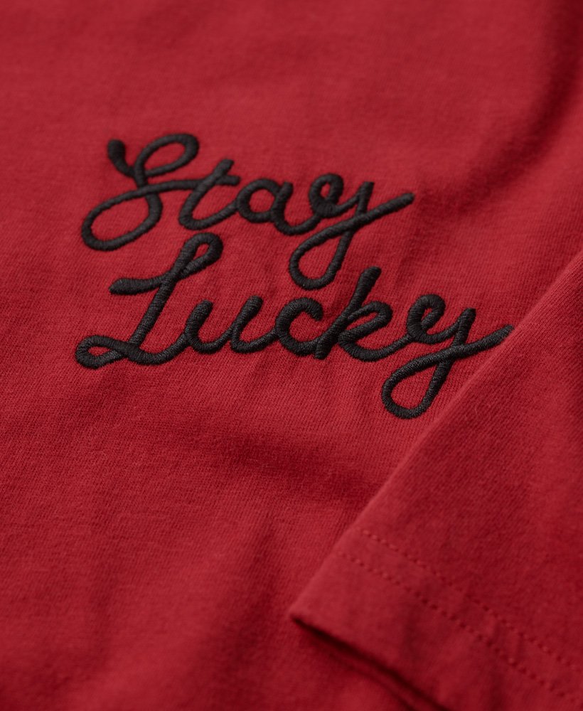 stay lucky graphic t-shirt in chilli pepper red