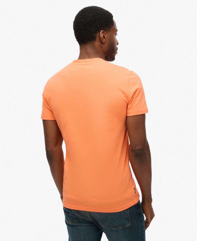t-shirt met v-hals en essential-logo van biologisch katoen in sunburst coral.