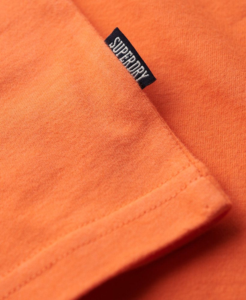t-shirt met v-hals en essential-logo van biologisch katoen in sunburst coral.