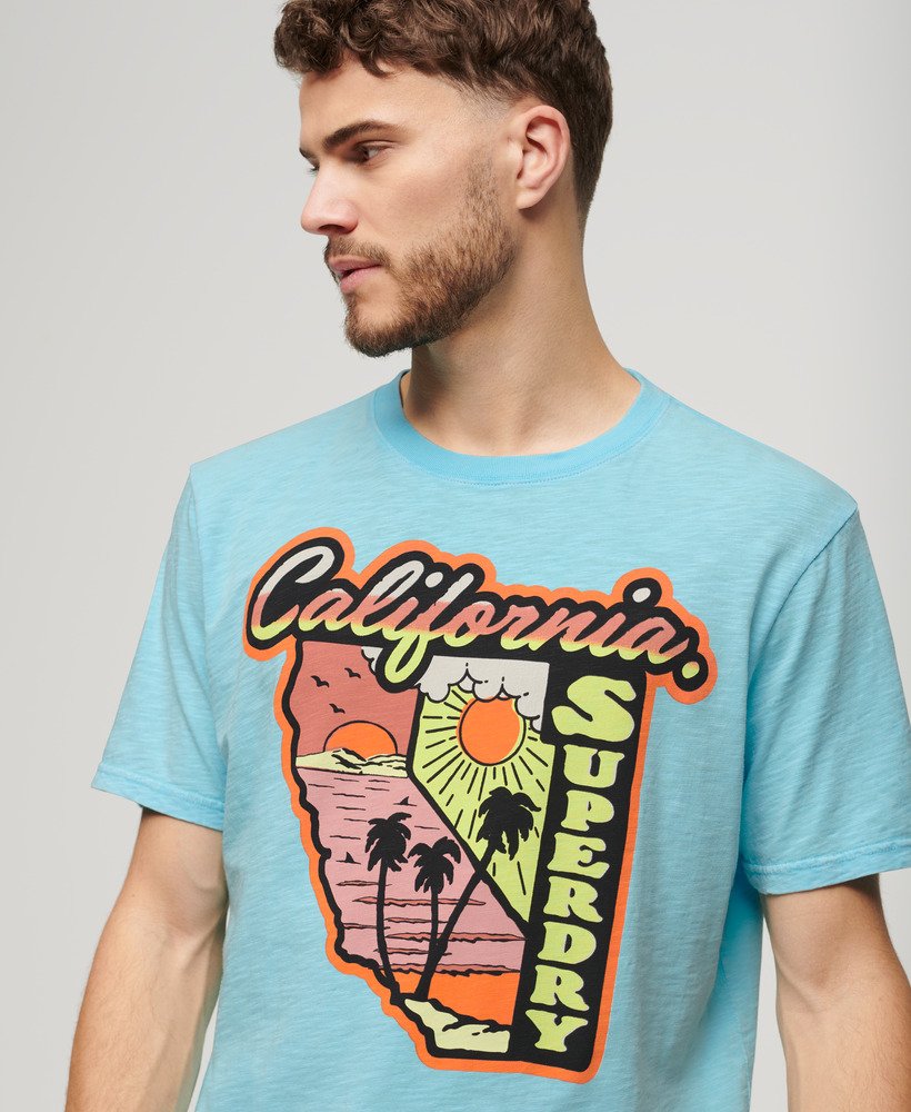 neon travel graphic loose t-shirt in kingfisher blue slub