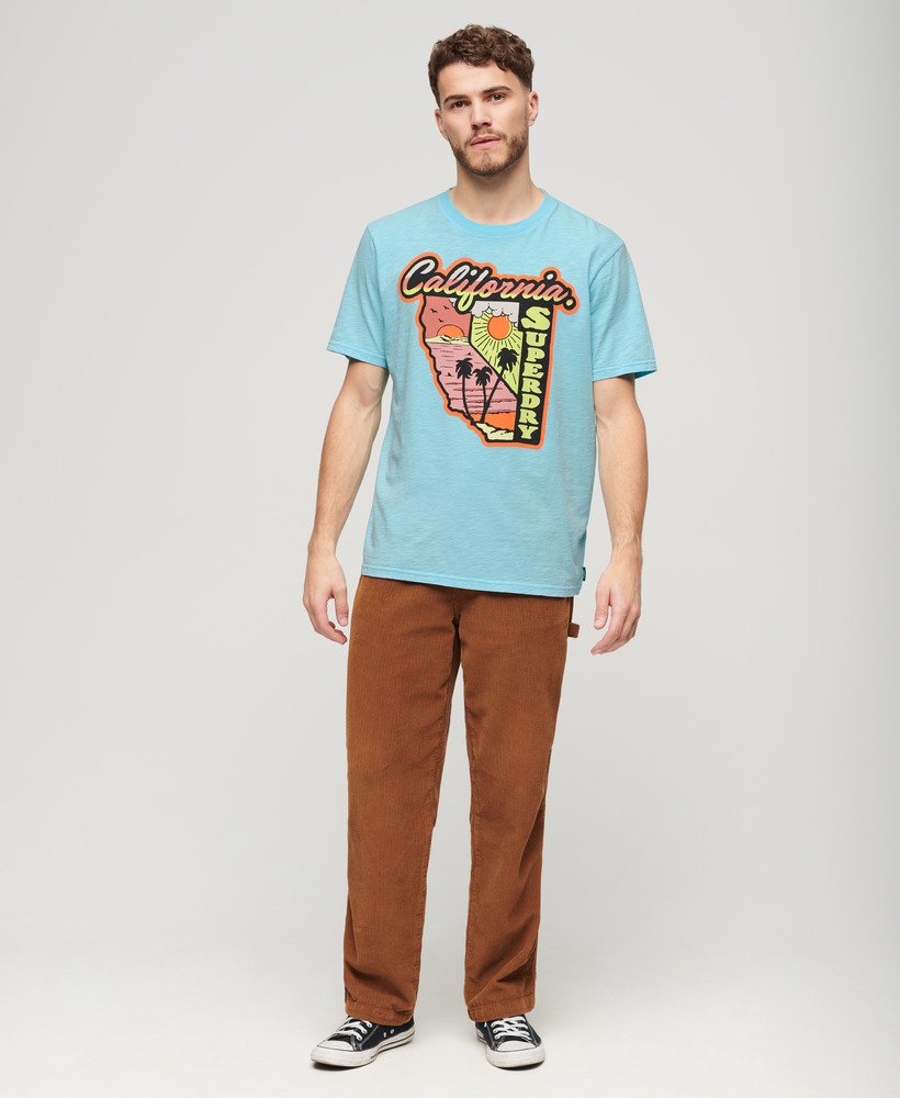 neon travel graphic loose t-shirt in kingfisher blue slub