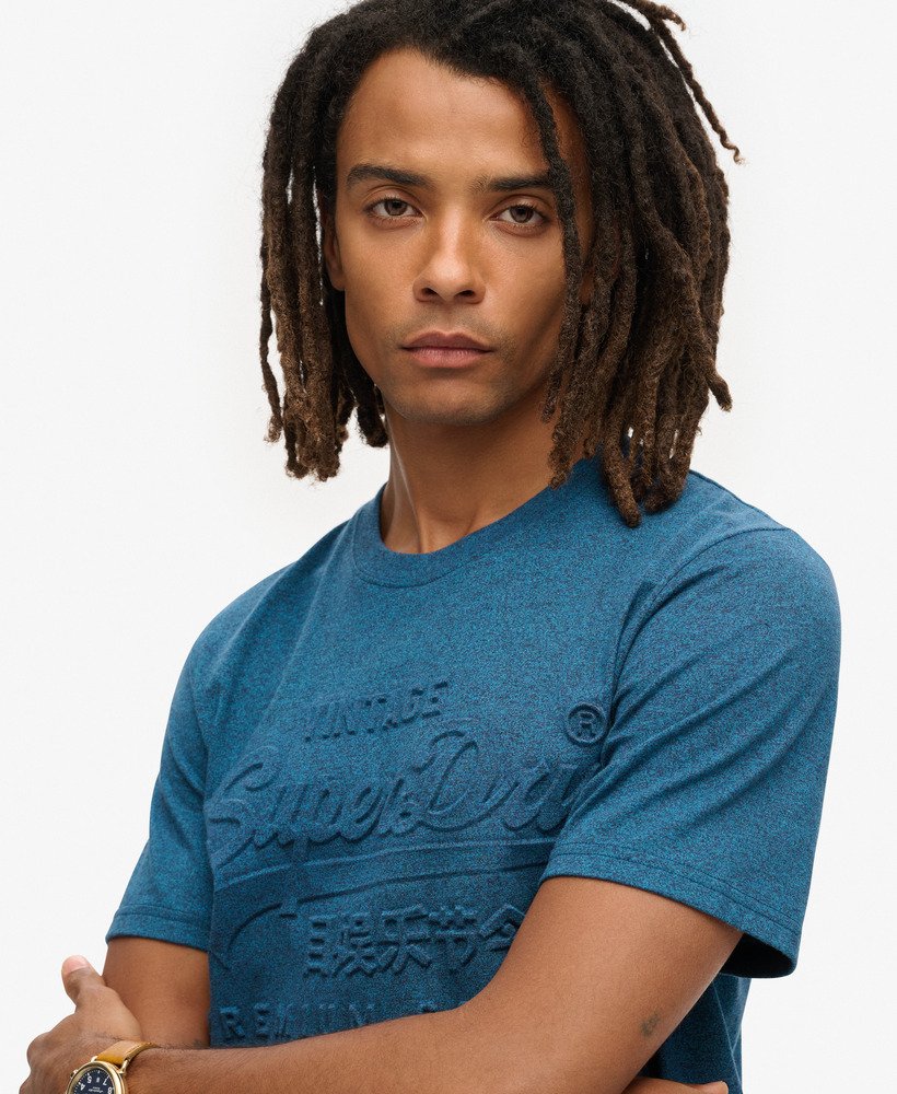 t-shirt met reliëfprint in verkoolde turquoise tint.