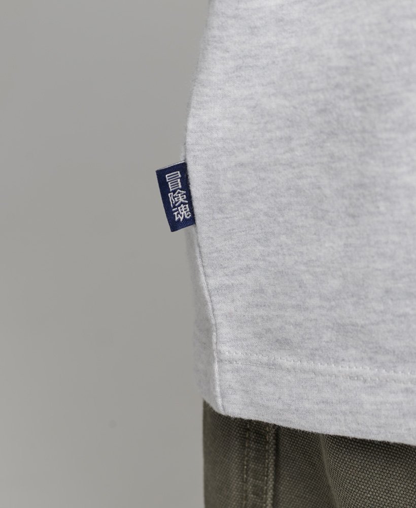 t-shirt van biologisch katoen met vintage logo en borduursel in glacier grey marl.