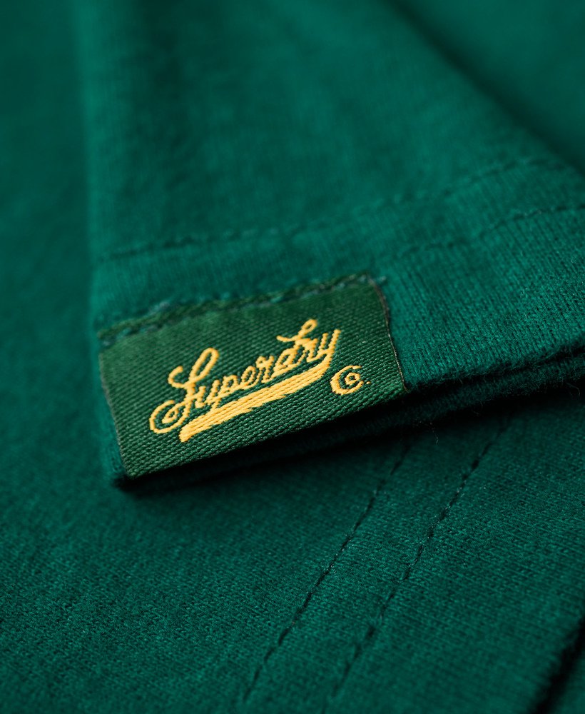 getailleerd varsity-t-shirt met fluweelachtige afwerking in donker bosgroen.