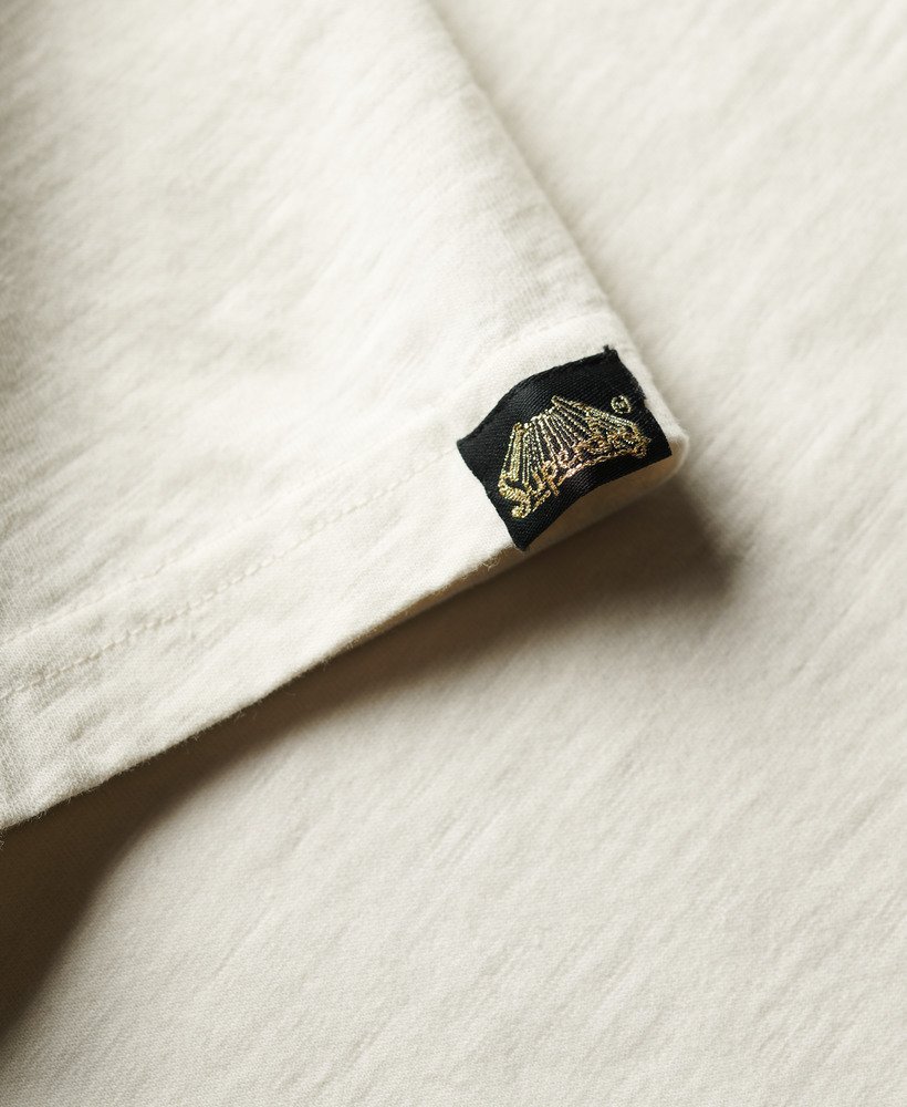 relaxed t-shirt met metallic logo in crèmekleurige slubstof.