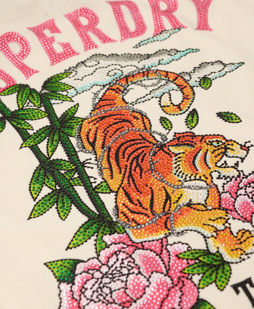 getailleerd t-shirt met tattoo- en strasssteentjes in rijstwit.