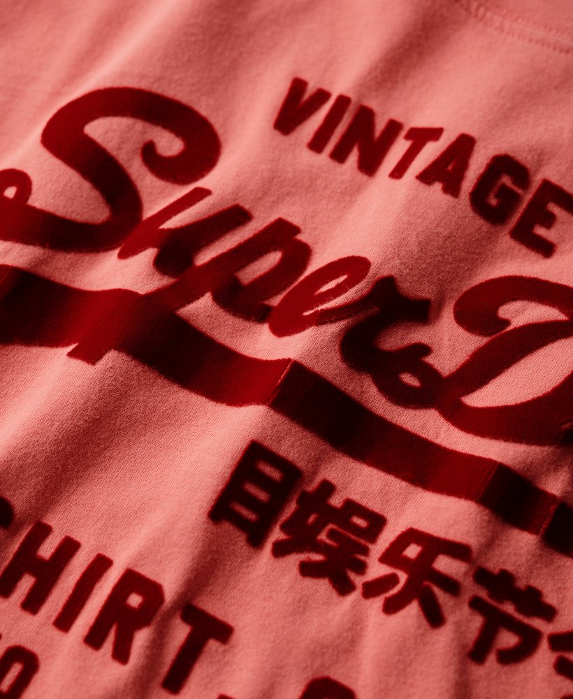 klassiek vintage logo-t-shirt met relaxte pasvorm in de kleur burnt coral.