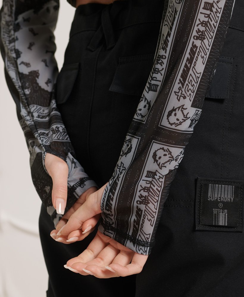 yama-no-kami mesh top met lange mouwen in zwart