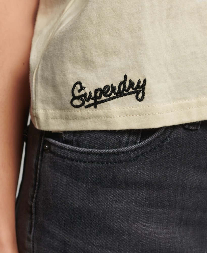 vintage tanktop met collegeprint in havermoutkleur.
