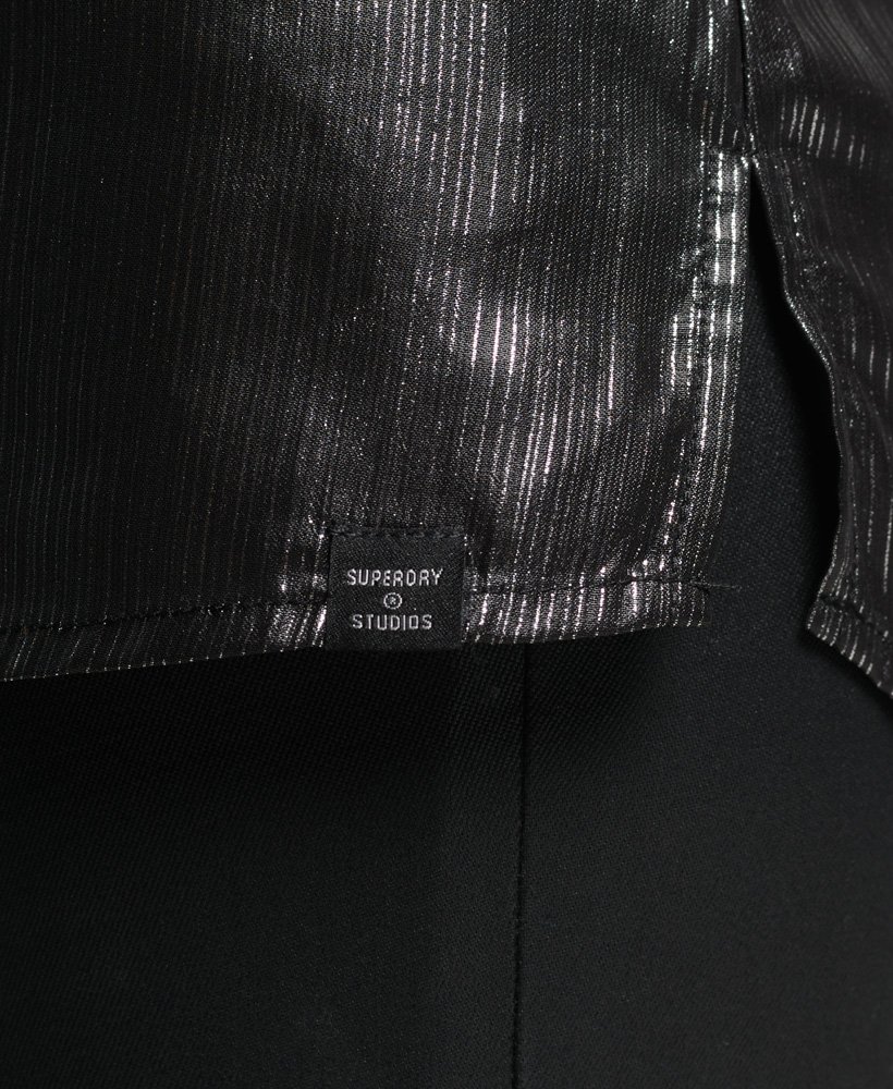 glittershirt met zwarte metallic strepen