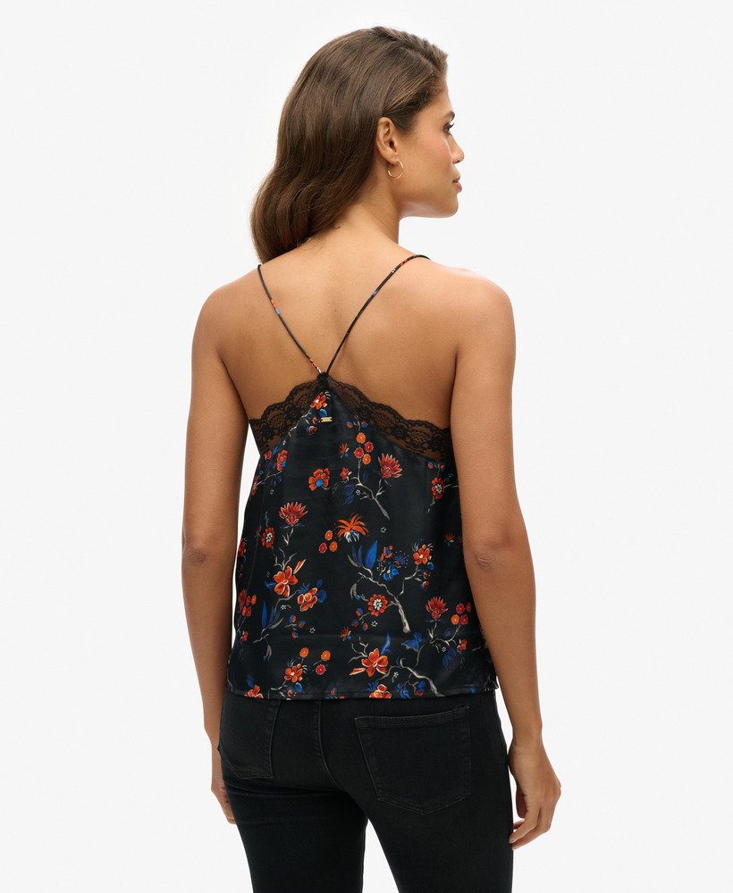 satijnen camisoletop met kanten afwerking in rinko zwarte print.