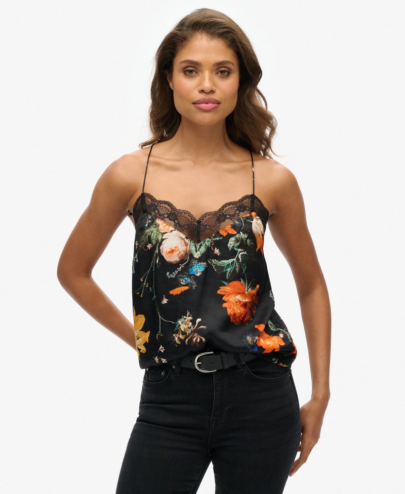 satijnen camisoletop met kanten afwerking in een speels zwart bloemenpatroon